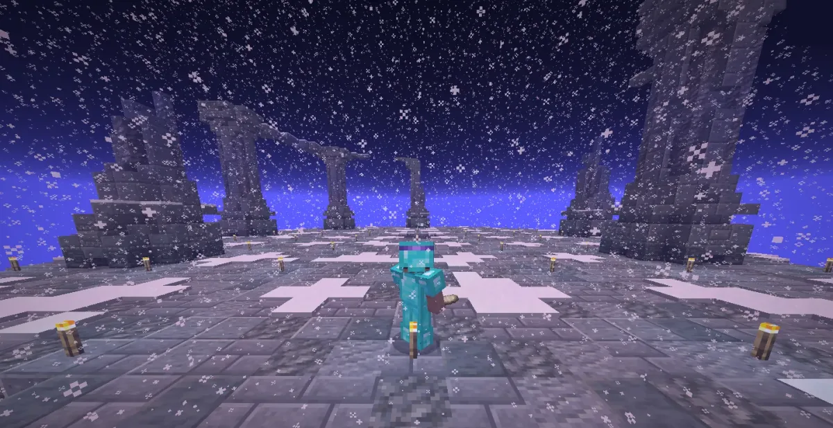 A player in diamond armour in a snowy arena of ruined stone arches at night