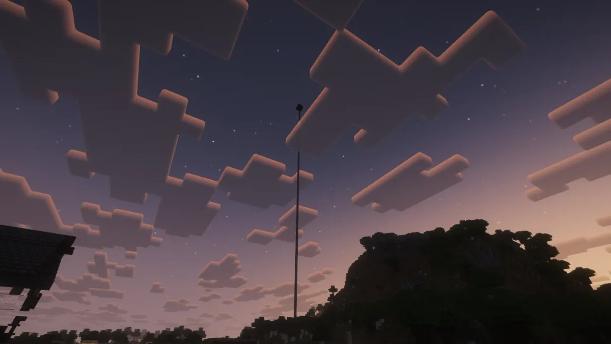Pastel blocky clouds at dusk with flagpole