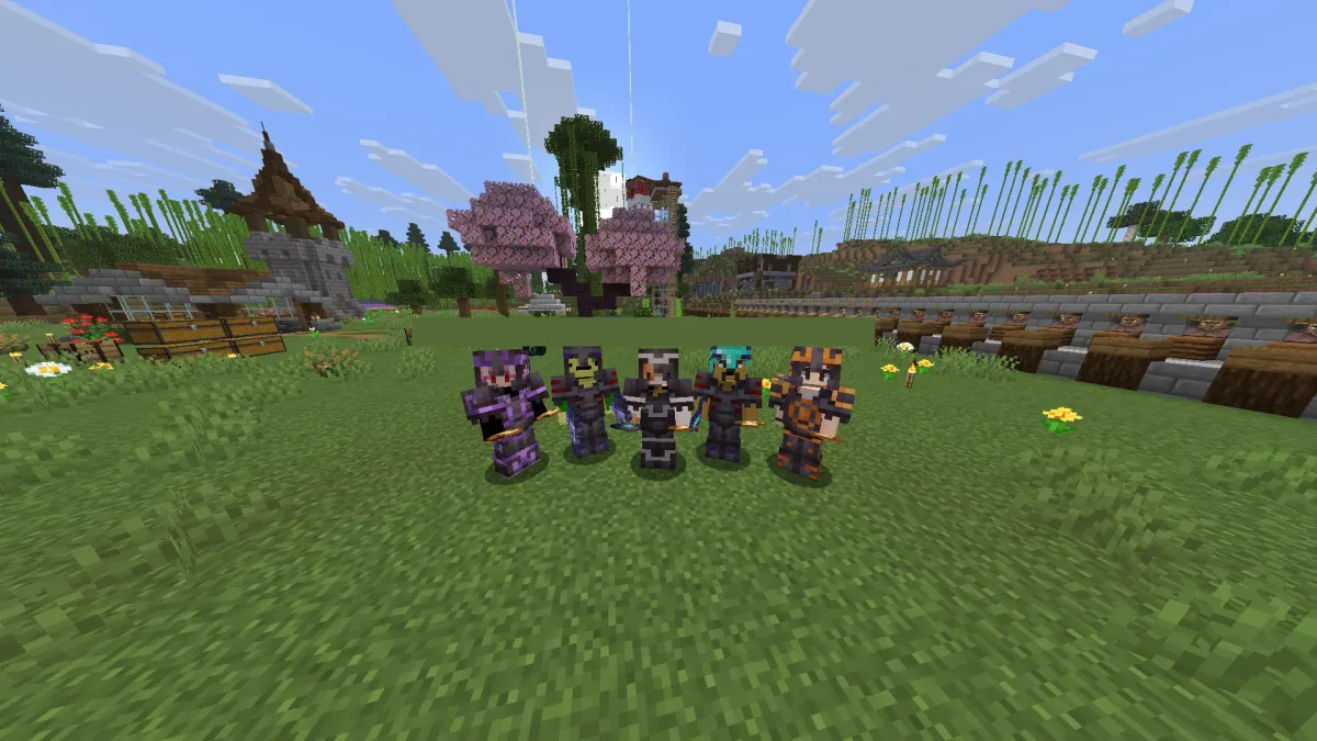 Five players in matching dark armour posing in a meadow by cherry trees